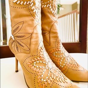 Beautiful detail on these leather boots. All leather